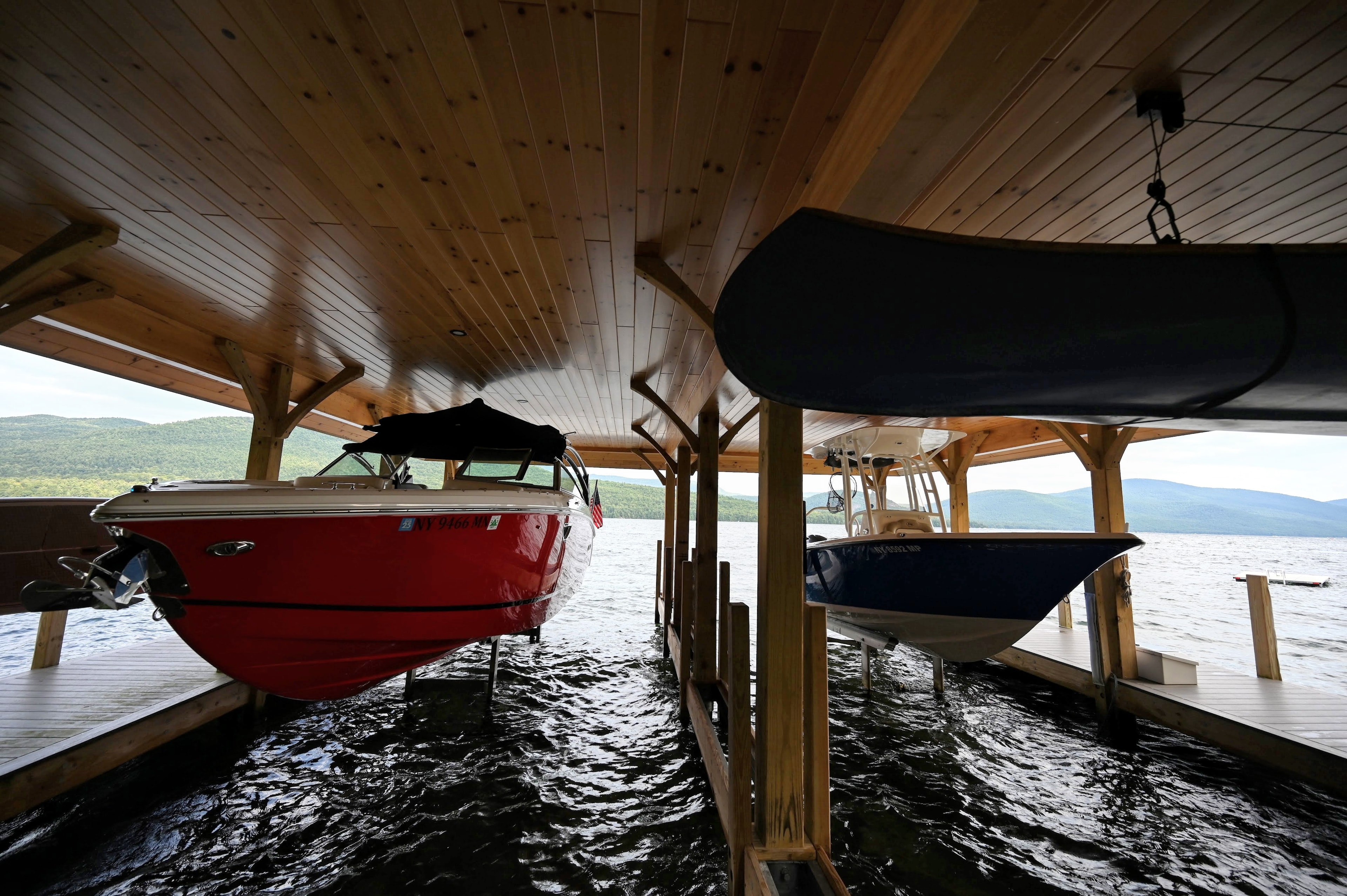 Boats docked at a Lake George marina